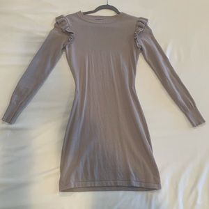 Dusty purple sweater dress. Long sleeves, with ruffle detail on shoulders